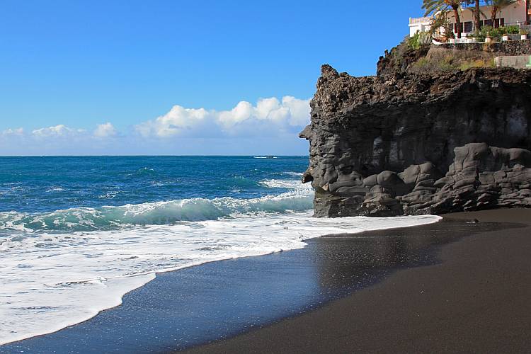 Black volcanic beach sand