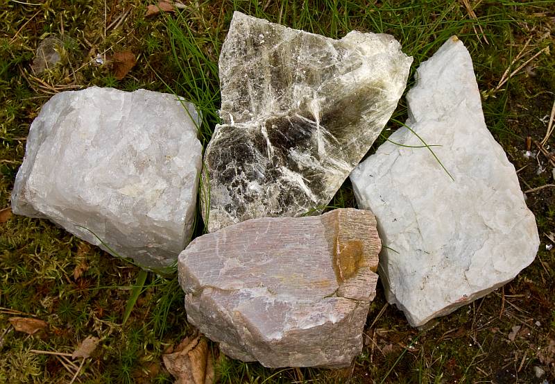 Large crystals of quartz, muscovite, plagioclase, microcline from a pegmatitic rock