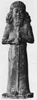 Terra-cotta figure of a god. From a foundation deposit at Babylon. [No. 90,9961]