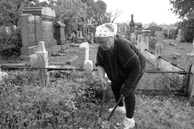 Beverly Rapiz was one of approximately 300 Mormon volunteers to clean Bayside Cemetery last week.    Photos by Michael Datikash